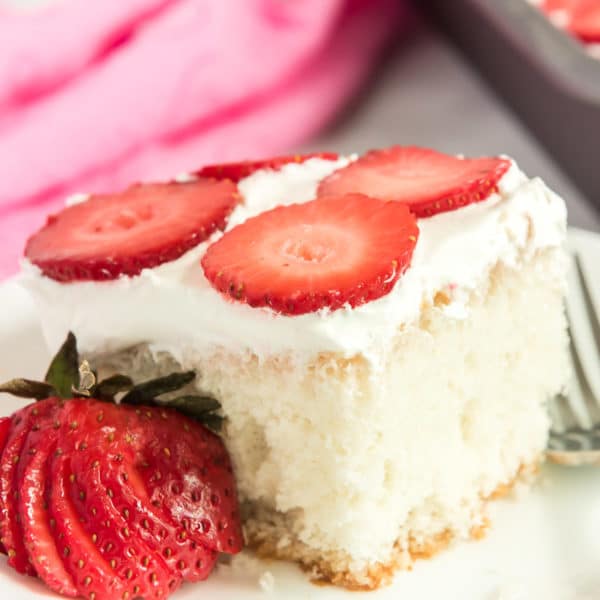 The Best Strawberry Poke Cake Recipe - Play Party Plan