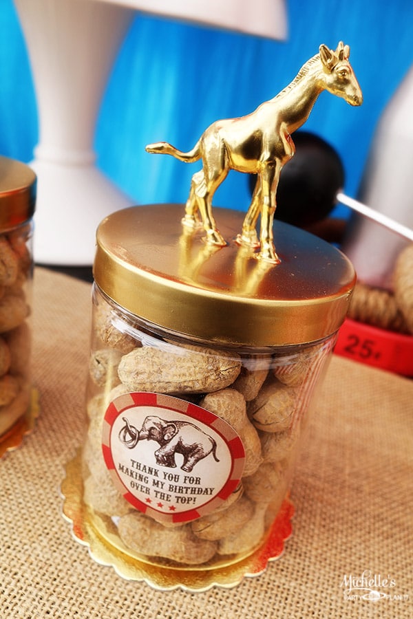 Gold animal topped circus party favors