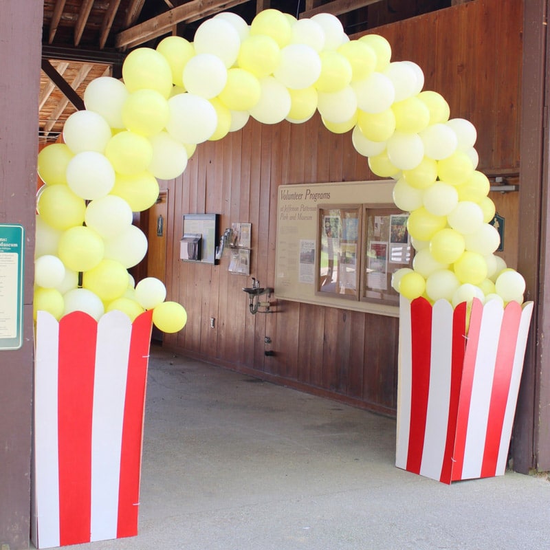 A popcorn arch at a circus theme party