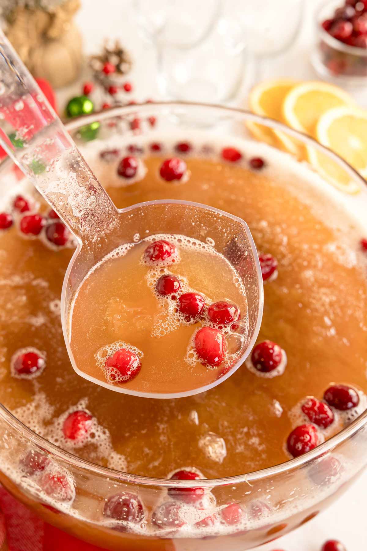 a punch bowl with Christmas punch in it