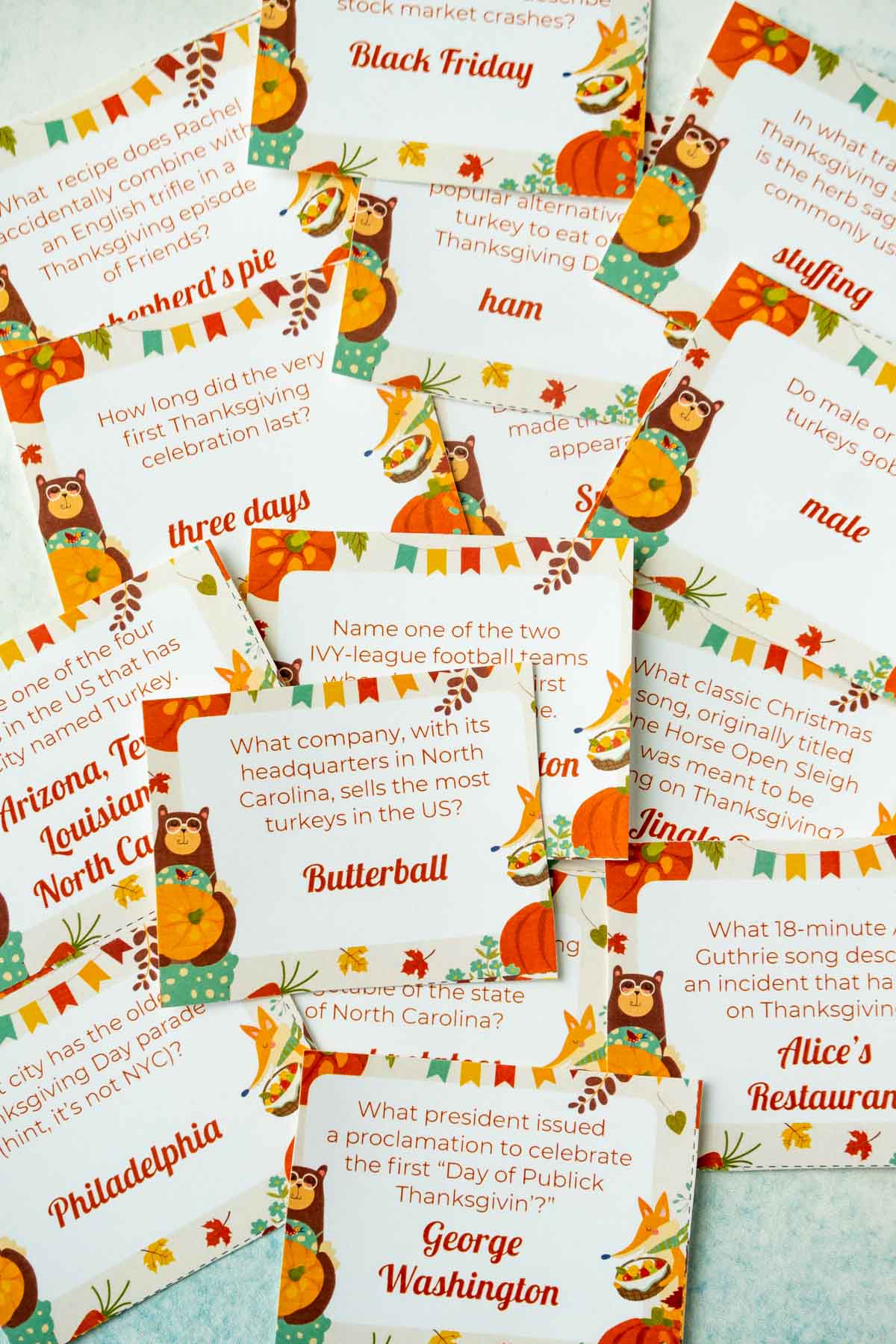 Pile of cards with Thanksgiving trivia questions on them
