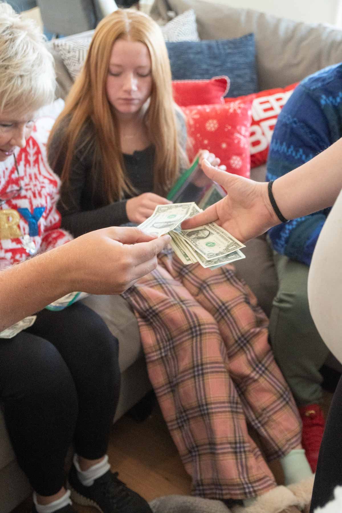 woman taking money away from someone