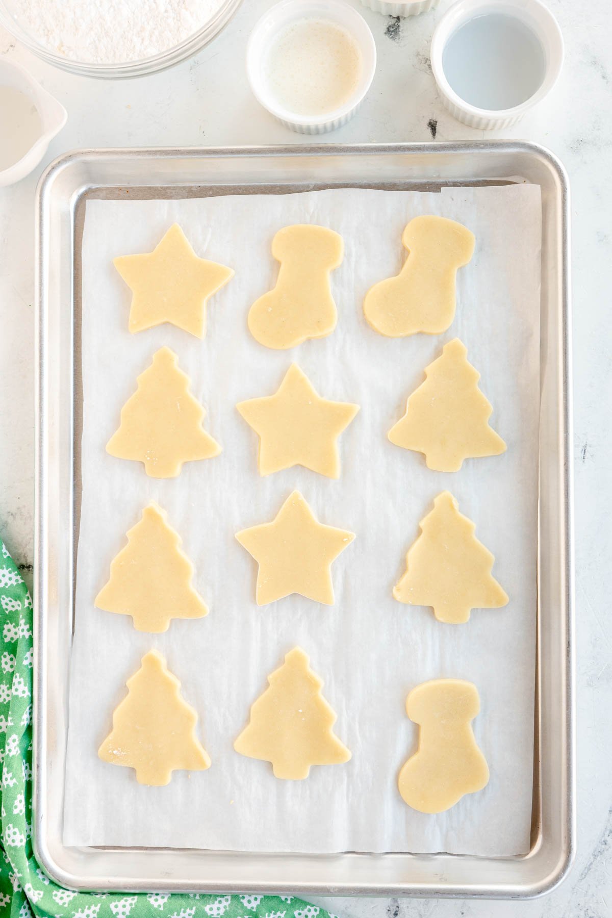 cream cheese sugar cookies on a baking sheet