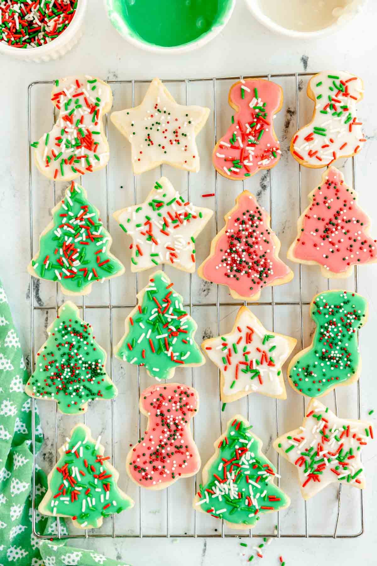 Christmas sugar cookies on a cooling rack