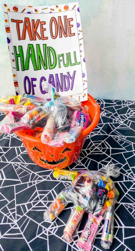 Free Printable Halloween Candy Signs & Hand Full of Candy Idea