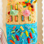 beach cake made with frosting and graham cracker sand