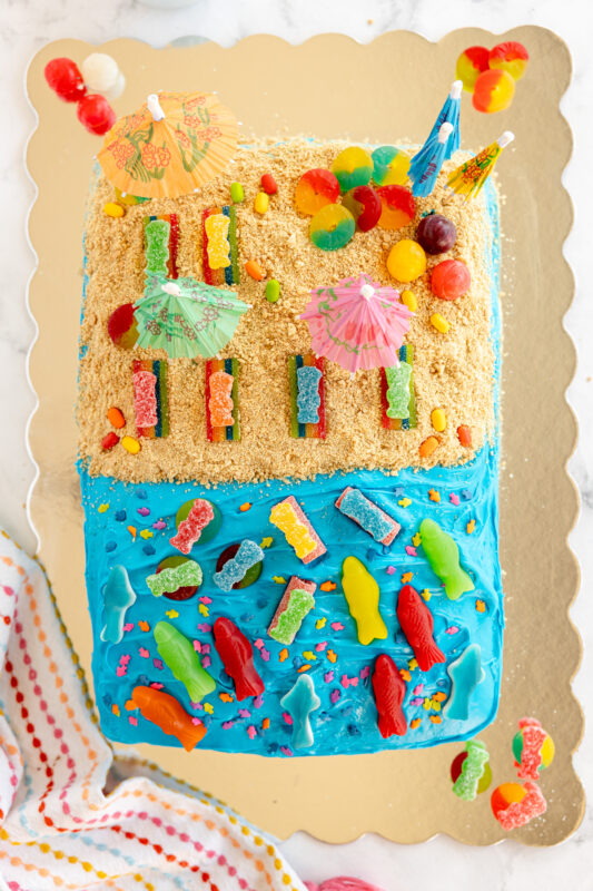 beach cake made with frosting and graham cracker sand