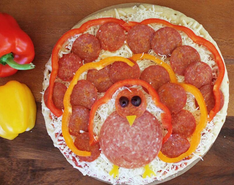pizza with topping shaped like a turkey