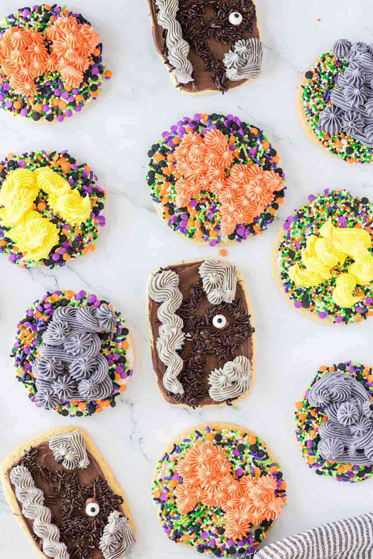 sugar cookies decorated with a variety of hocus pocus designs