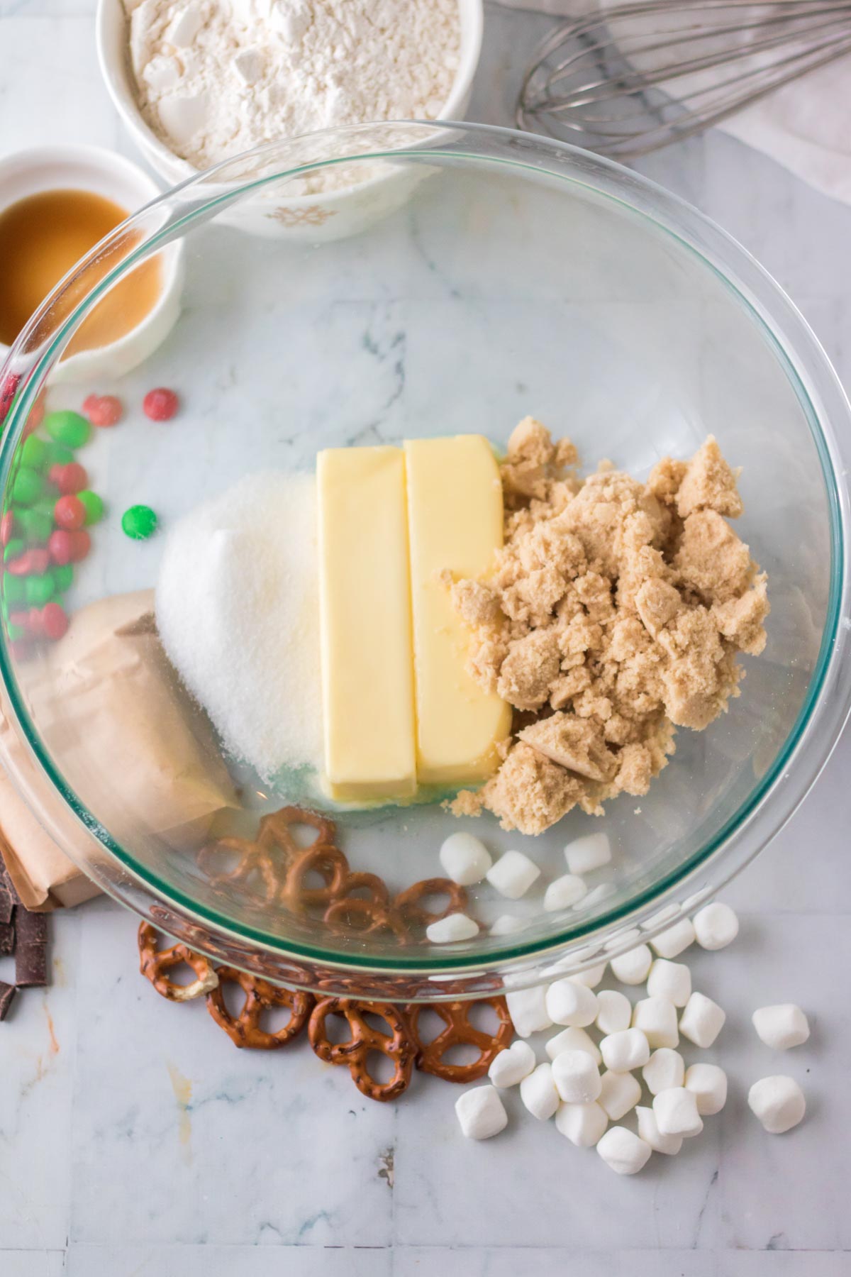 glass bowl with butter, sugar, and brown sugar