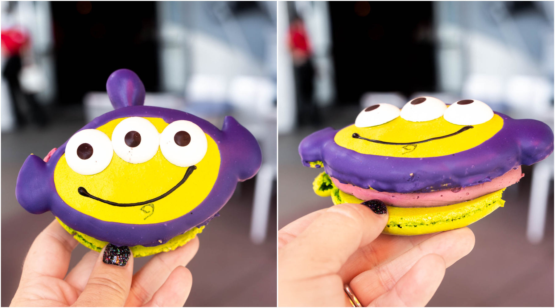 Hand holding a buzz alien macaron at Disneyland