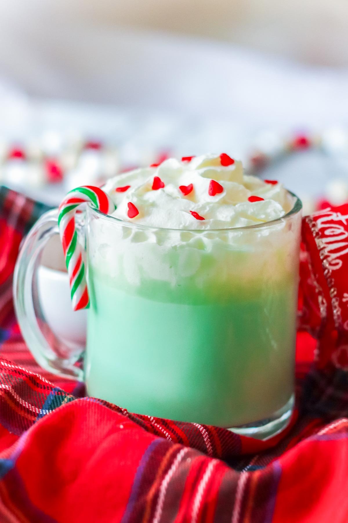 glass of green Grinch hot chocolate