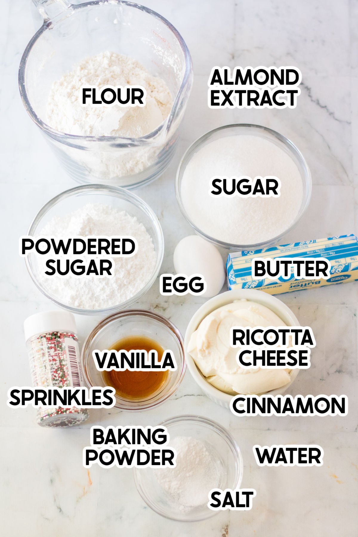 ingredients to make lemon ricotta cookies with labels