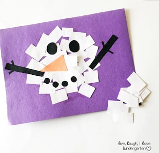 small cut pieces of paper glued into a circle with snowman features