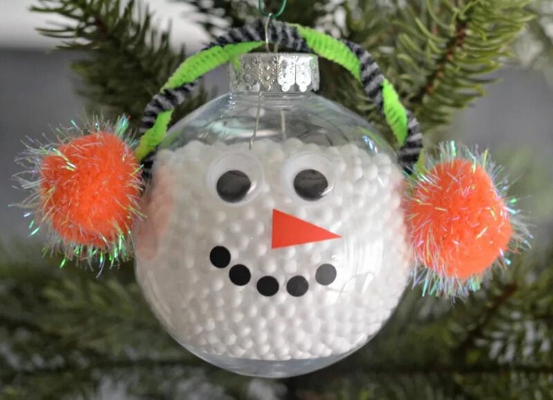 DIY ornament filled with foam beads and a snowman face