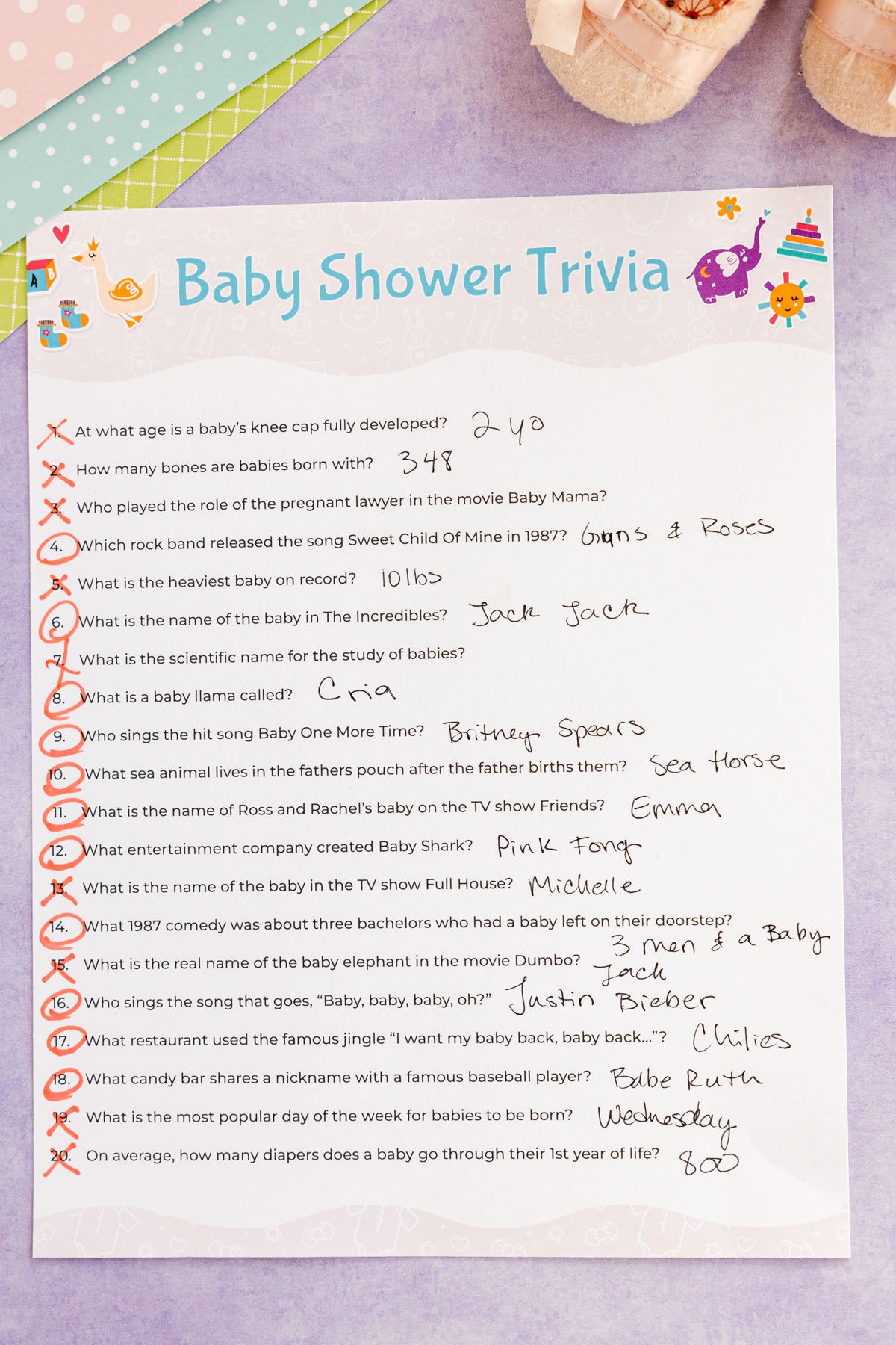 baby shower trivia with answers crossed out and circled