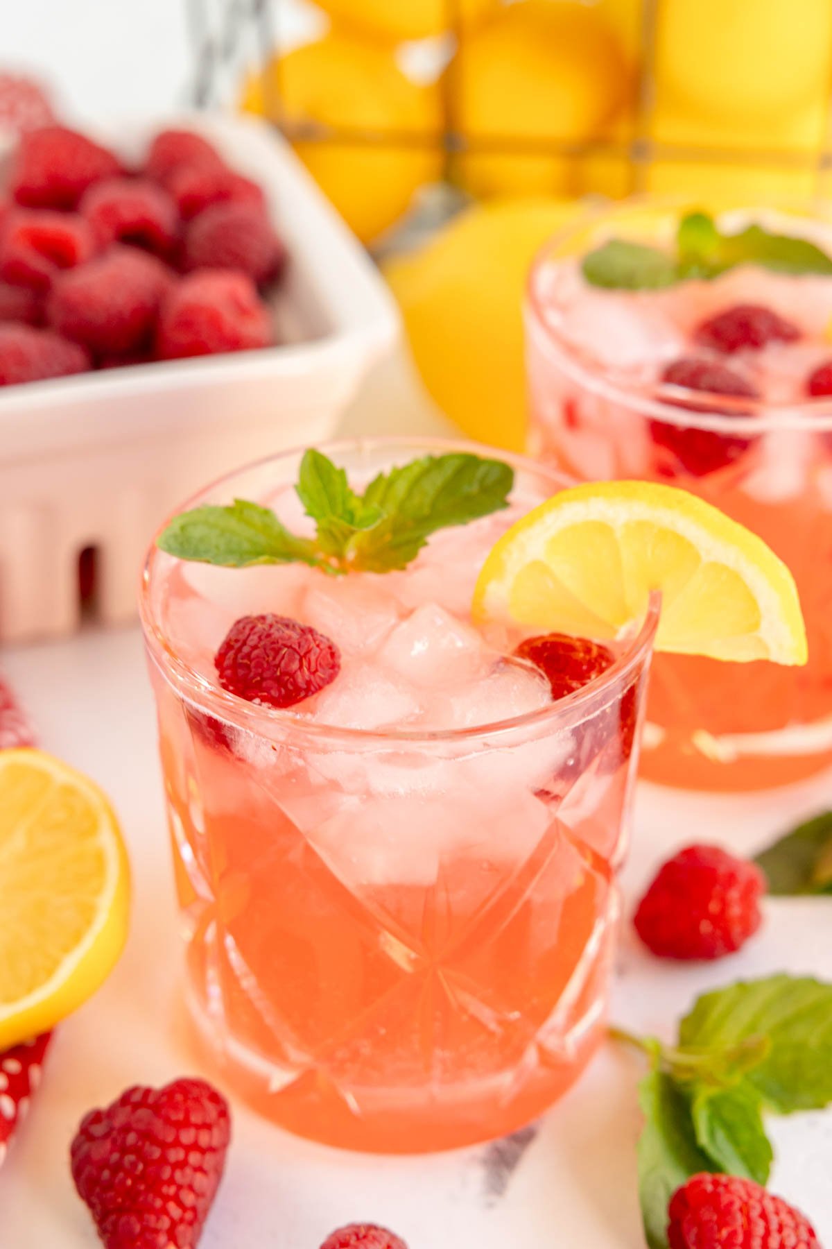 glass filled with a raspberry mocktail