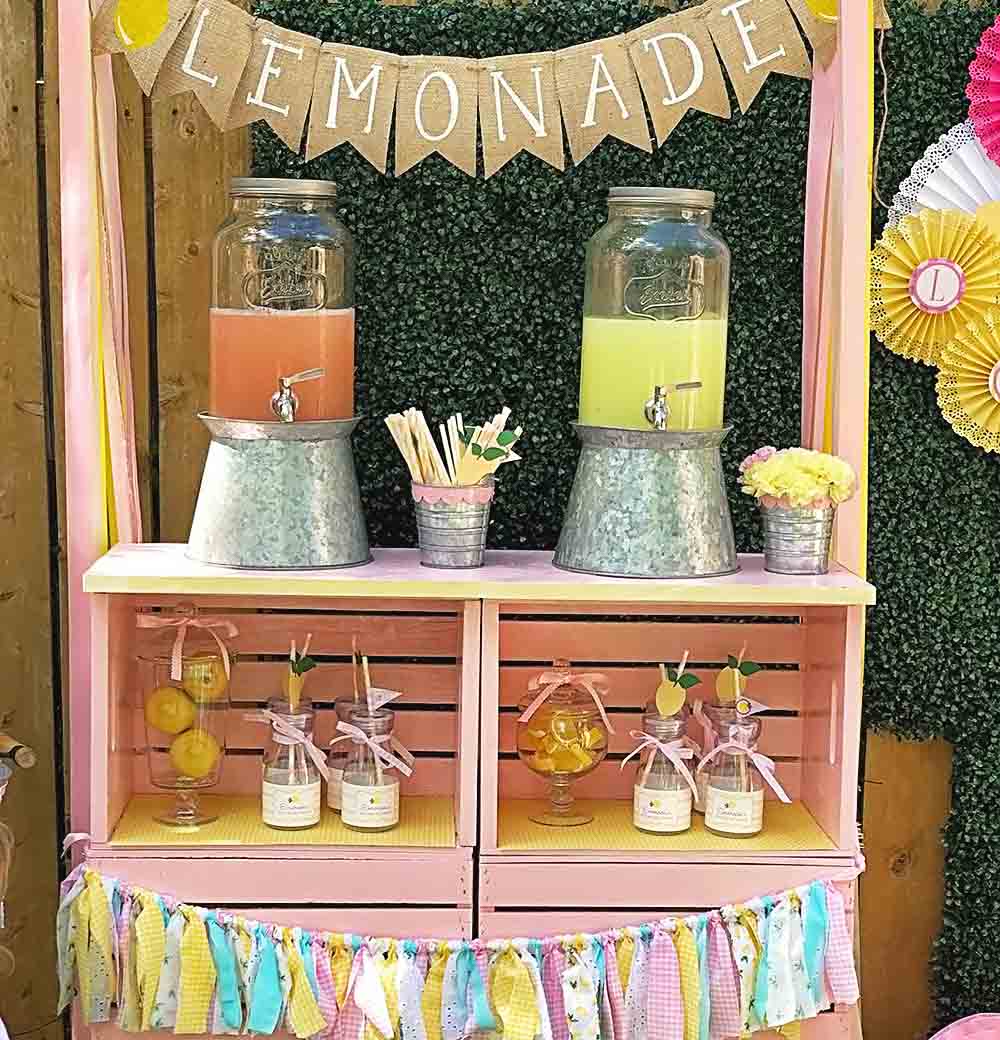 lemonade stand with pink and yellow lemonade