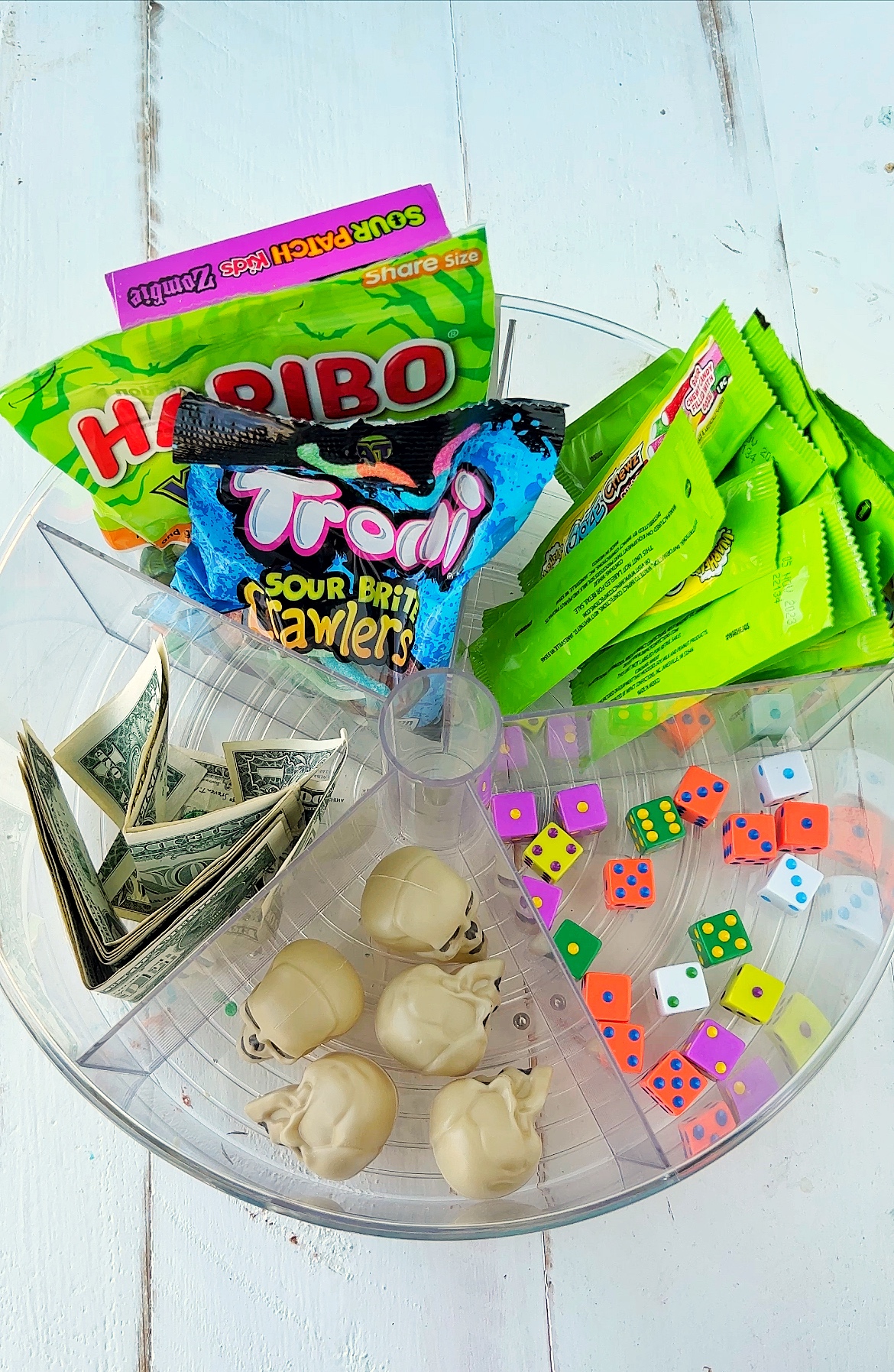 lazy susan with prizes, dice, and candy