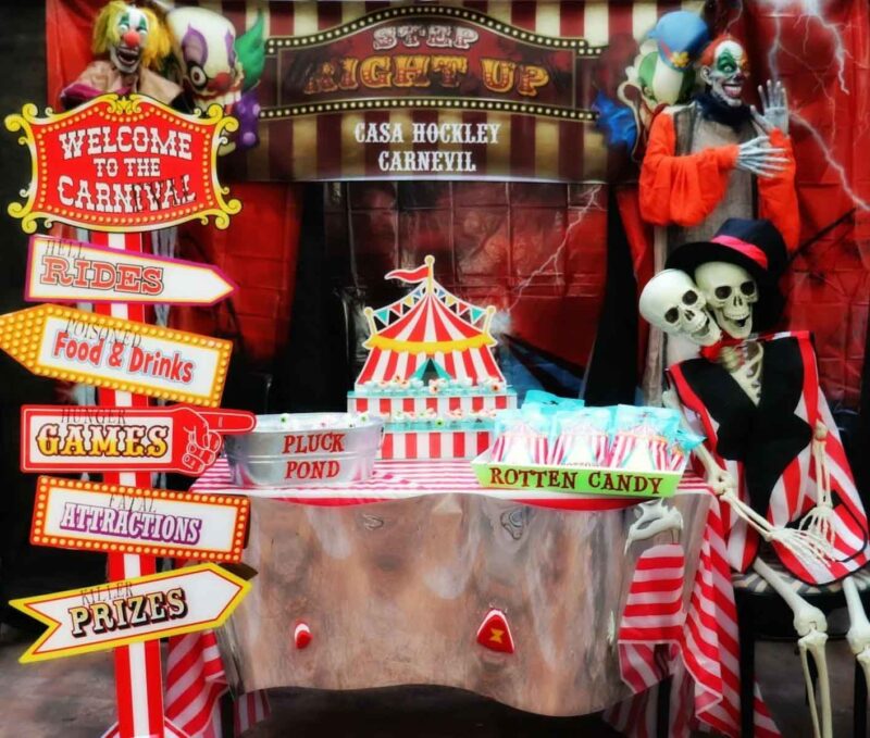 carnival table setting with spooky skeletons and clowns