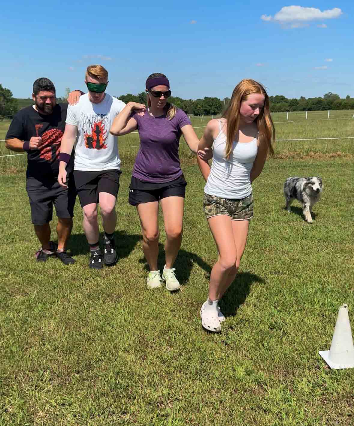 adults going around a coin