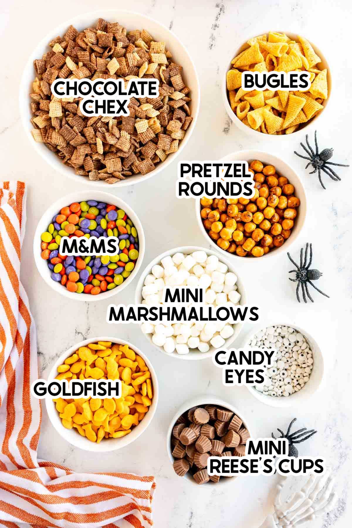 ingredients to make a Halloween snack mix with labels