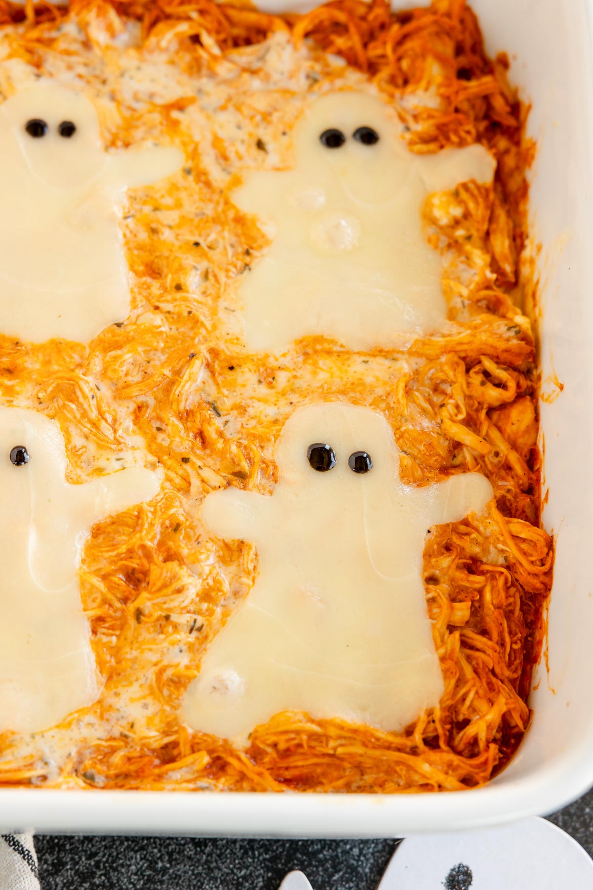 Halloween buffalo chicken dip with ghost cheese slices