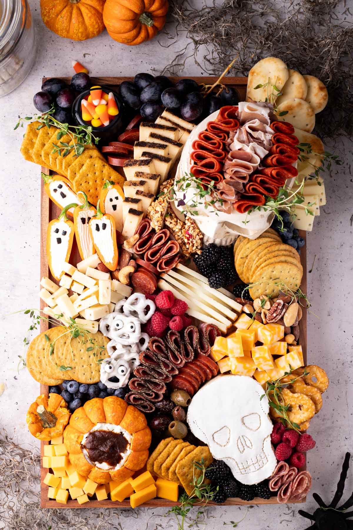 Halloween charcuterie board with lots of meat and cheese