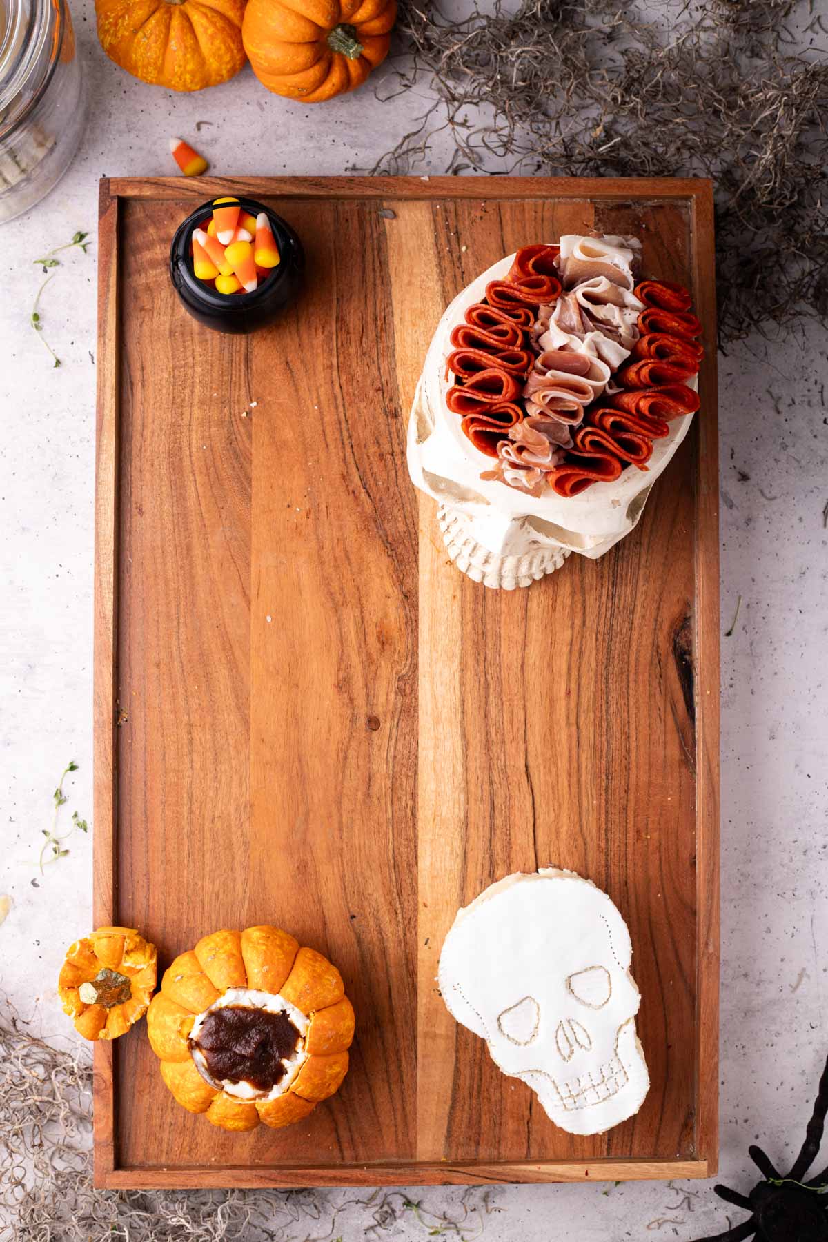 charcuterie board with Halloween items on it