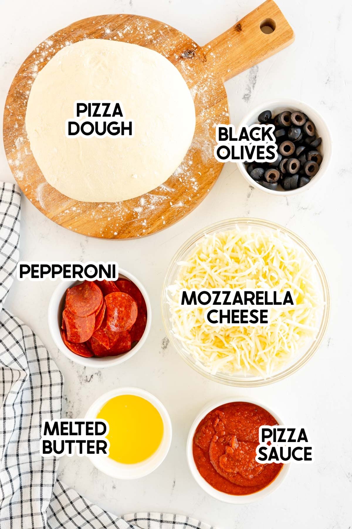 ingredients in mummy pizza loaf with labels