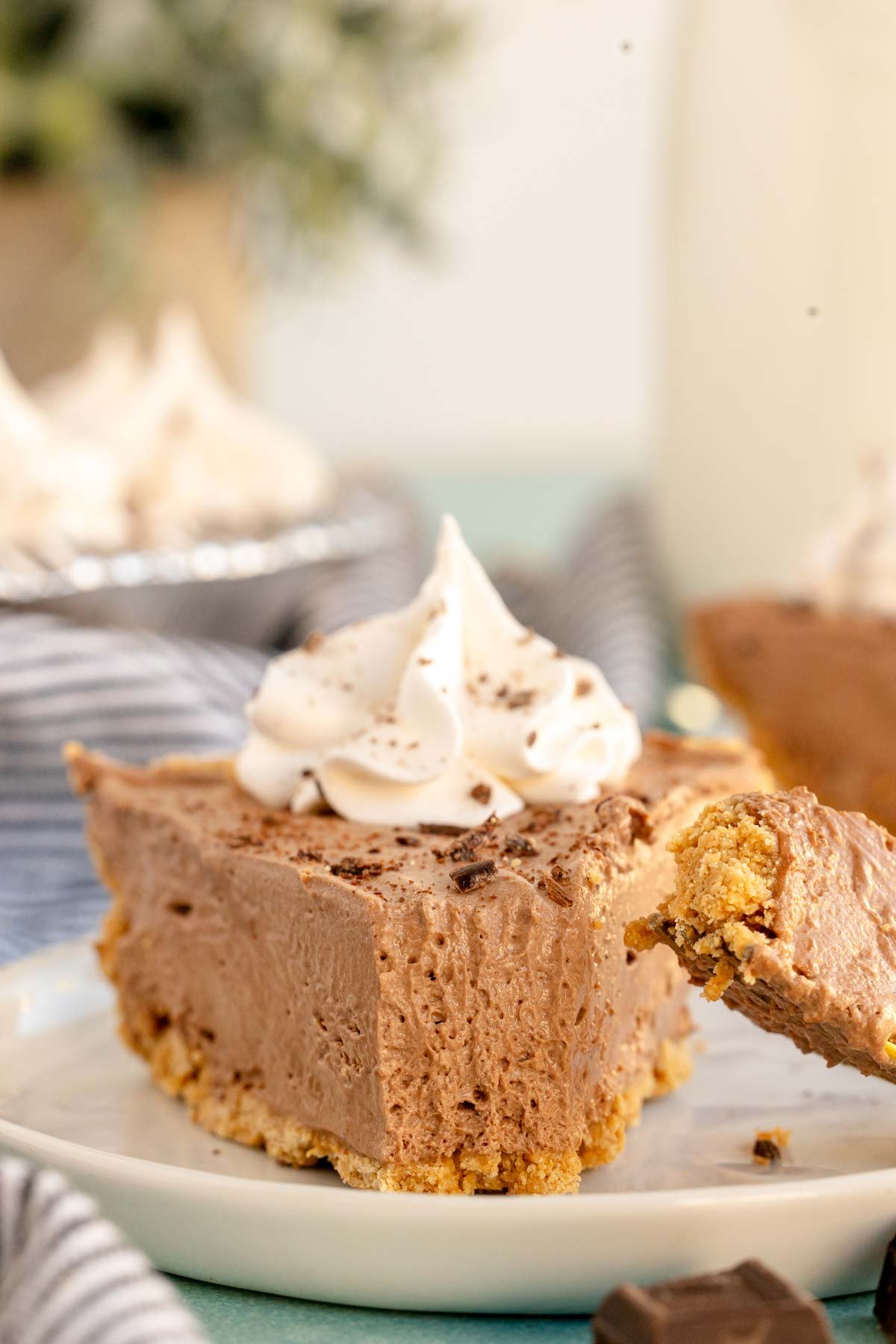 slice of no bake chocolate pie on a white plate 