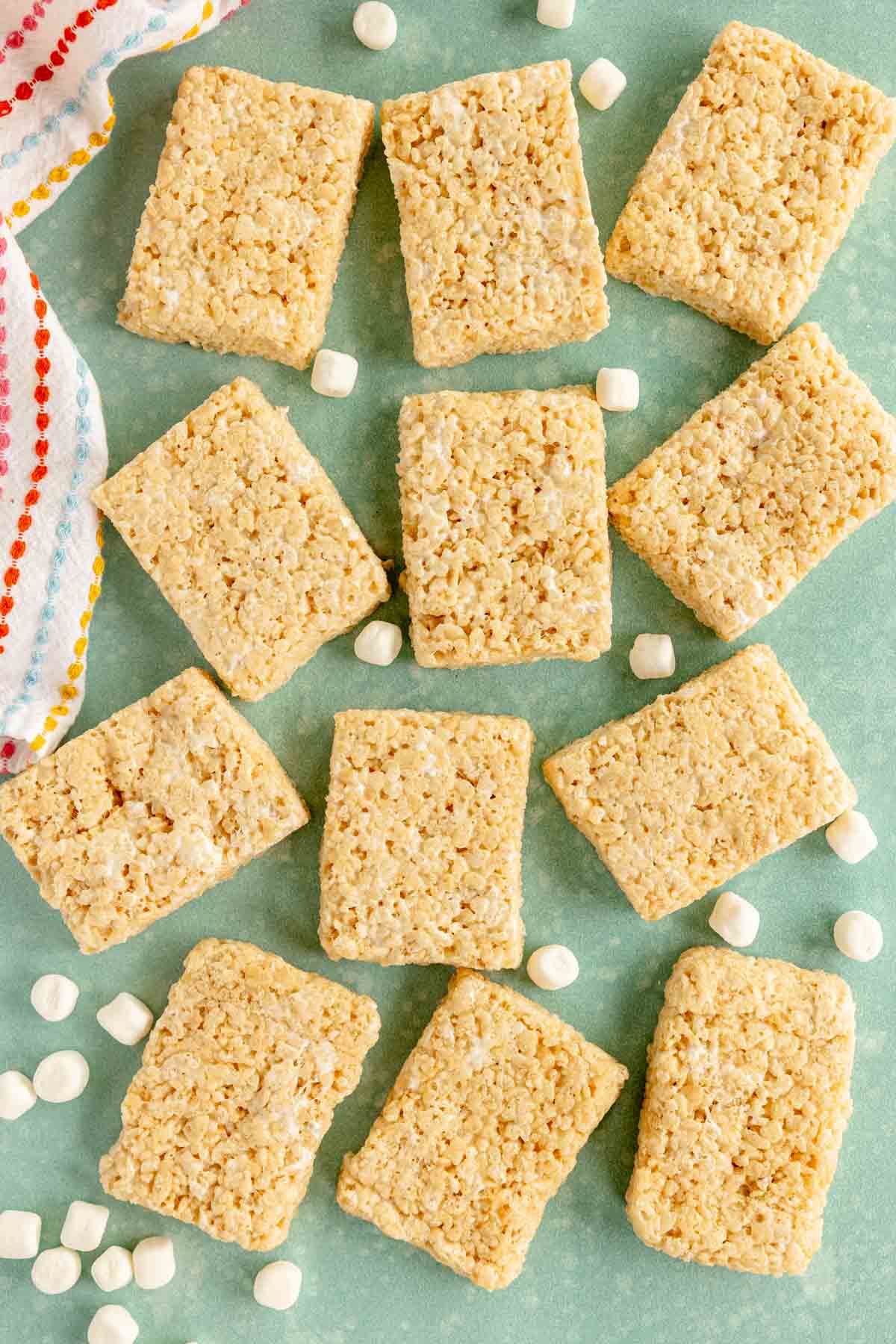 rectangle shaped rice krispy treats with marshmallows on a table