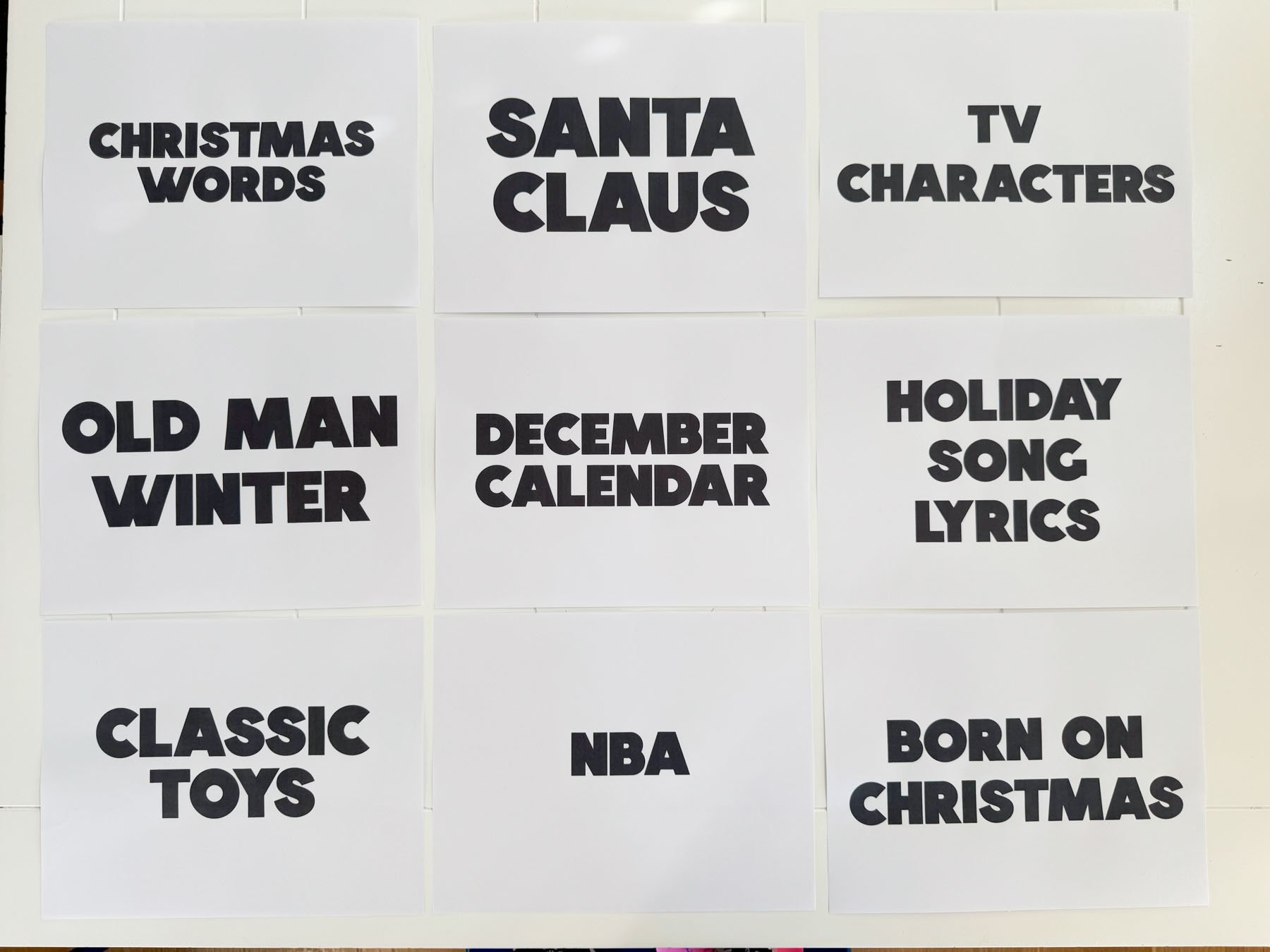 Christmas category sheets on a white table