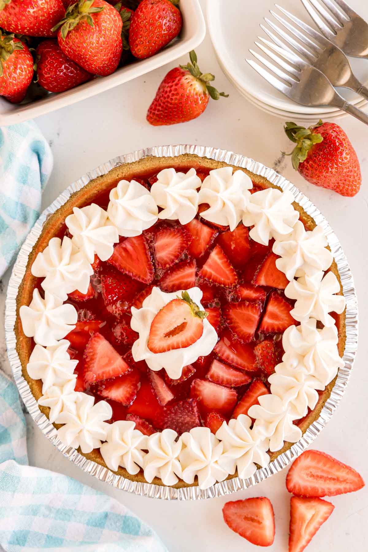 strawberry jello pie covered with Cool Whip