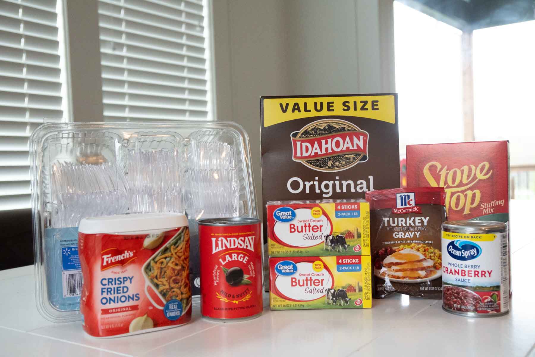 a bunch of Thanksgiving ingredients in a pile on a table