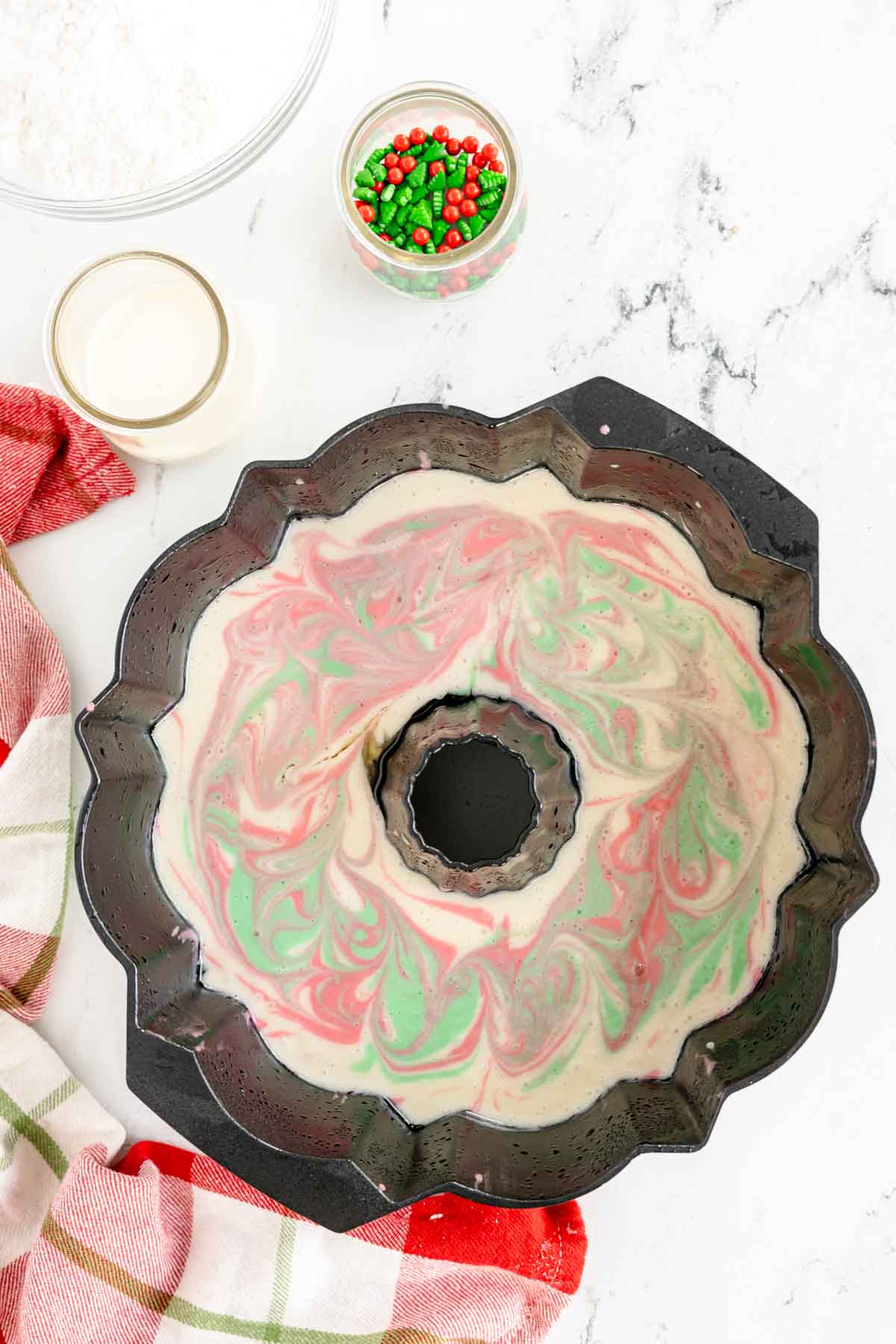 Christmas bundt cake batter in a bundt cake pan