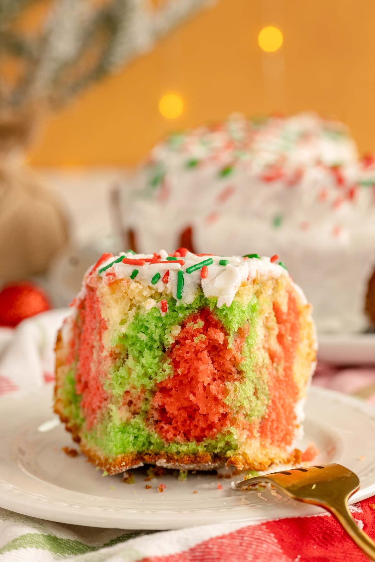 A piece of Christmas bundt cake on a plate