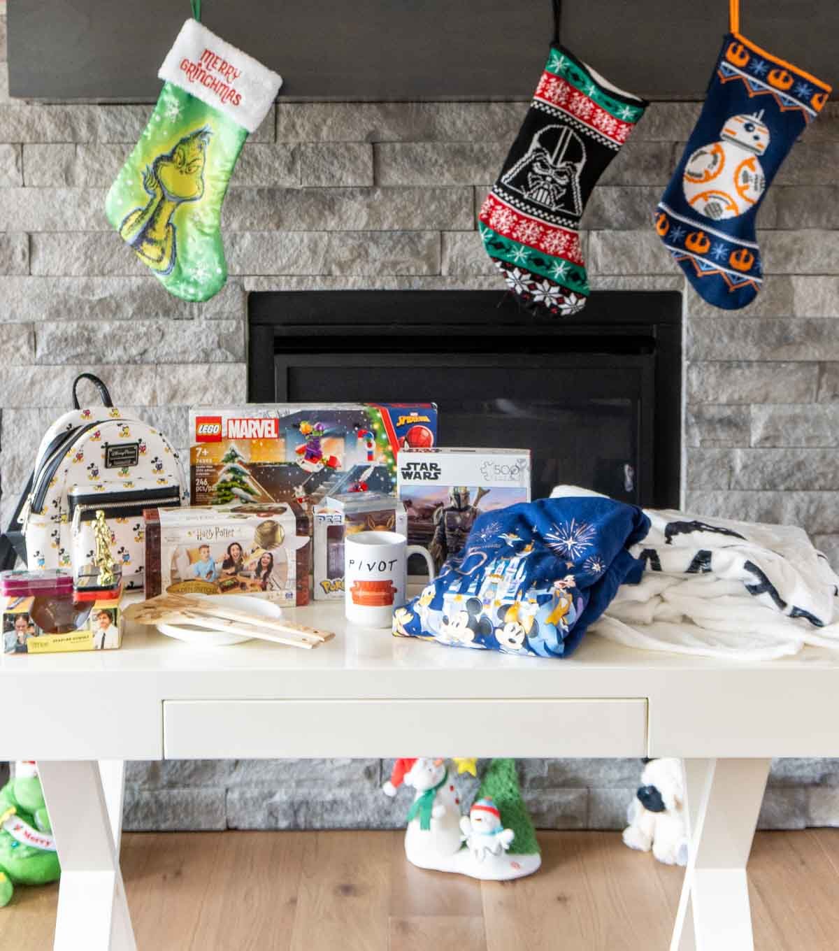 a bunch of pop culture items on a white table