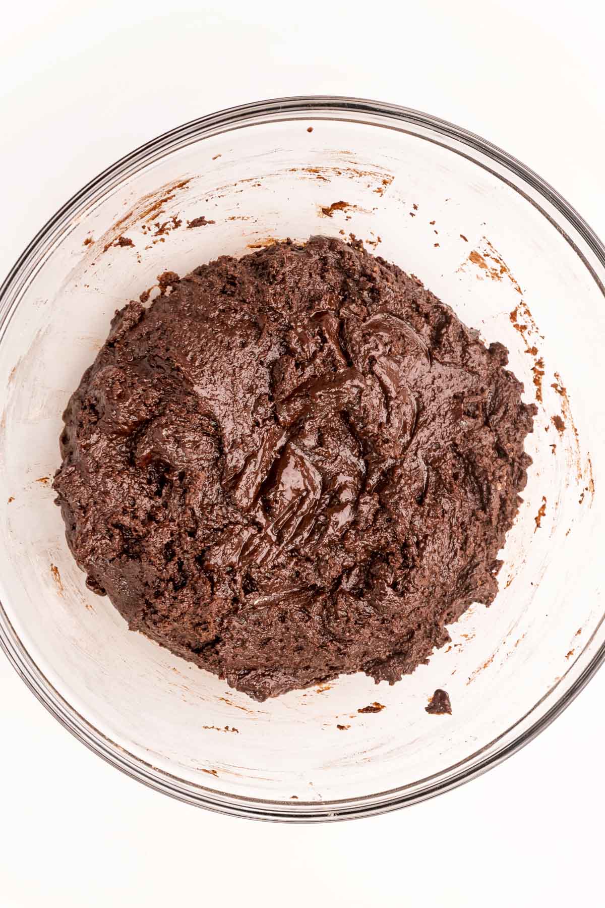 dark chocolate sugar cookie dough in a glass bowl