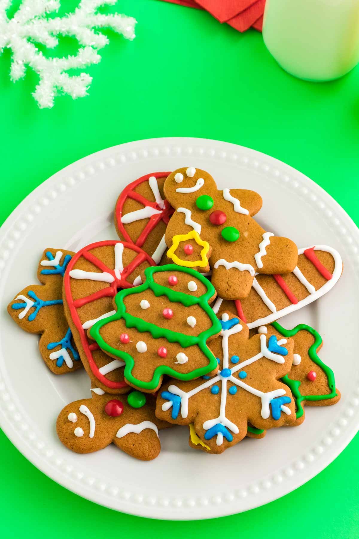 white plate with a pile of gingerbread cookie