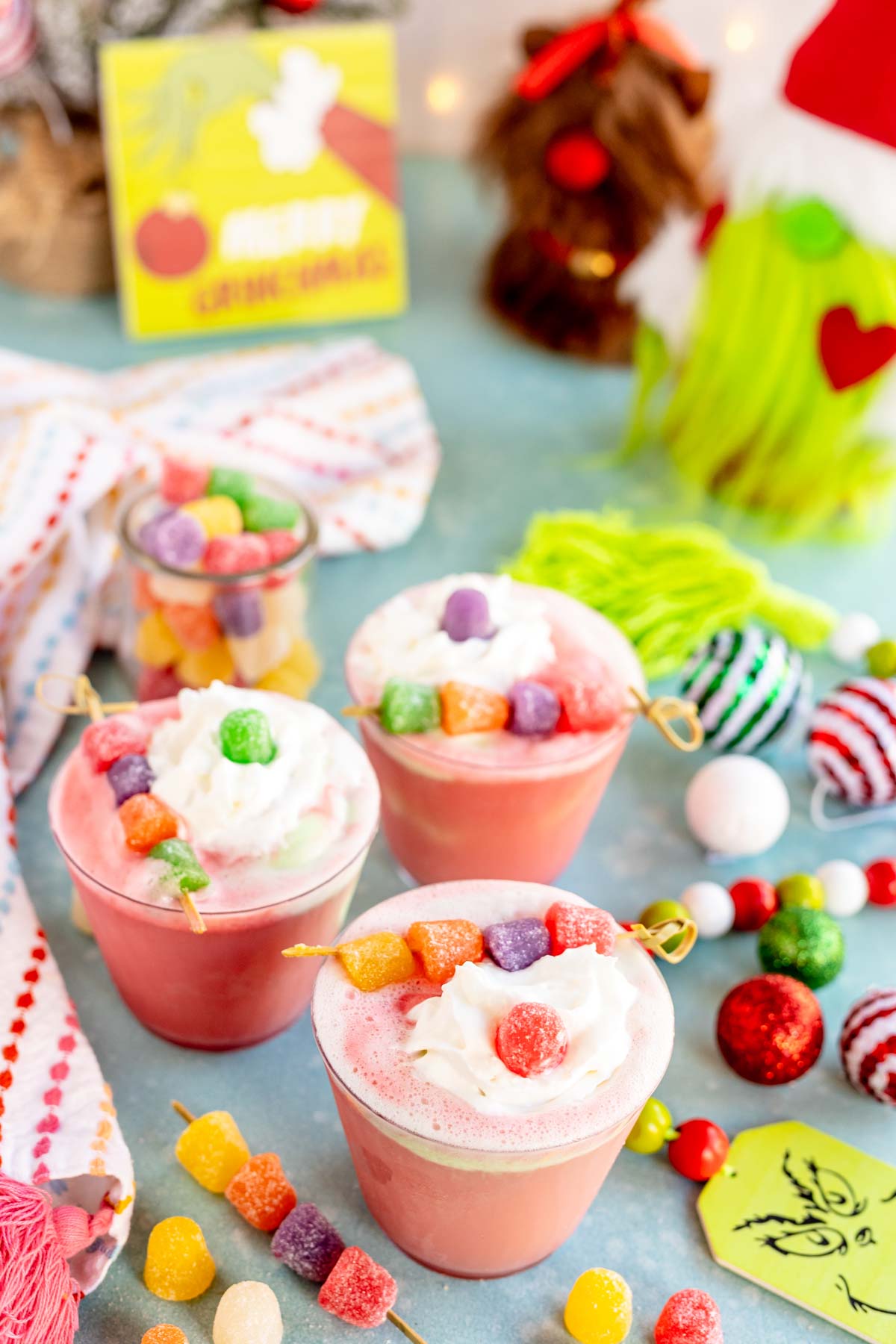 three glasses of a gumdrop Christmas punch