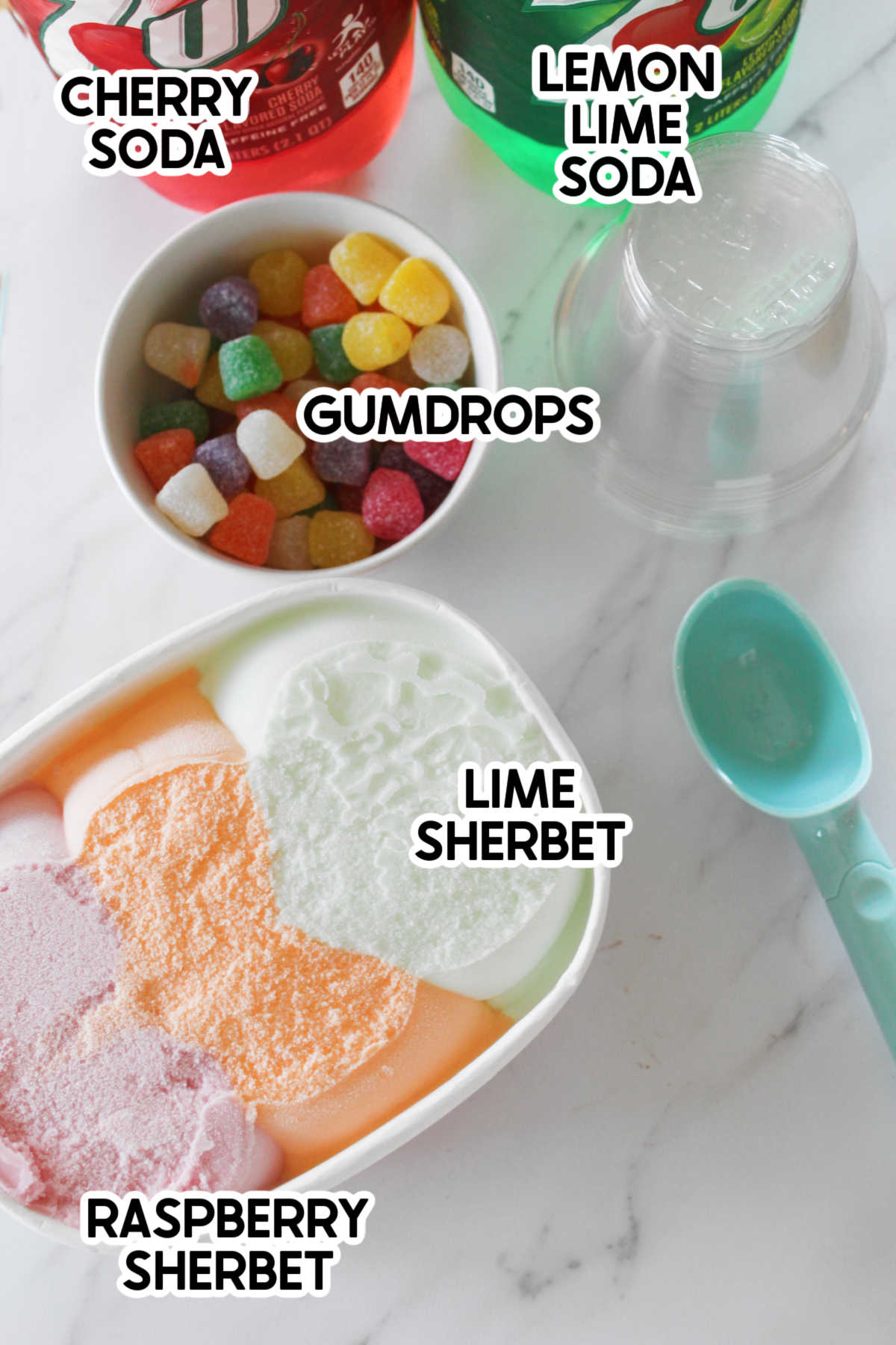 ingredients to make a gumdrop punch with labels