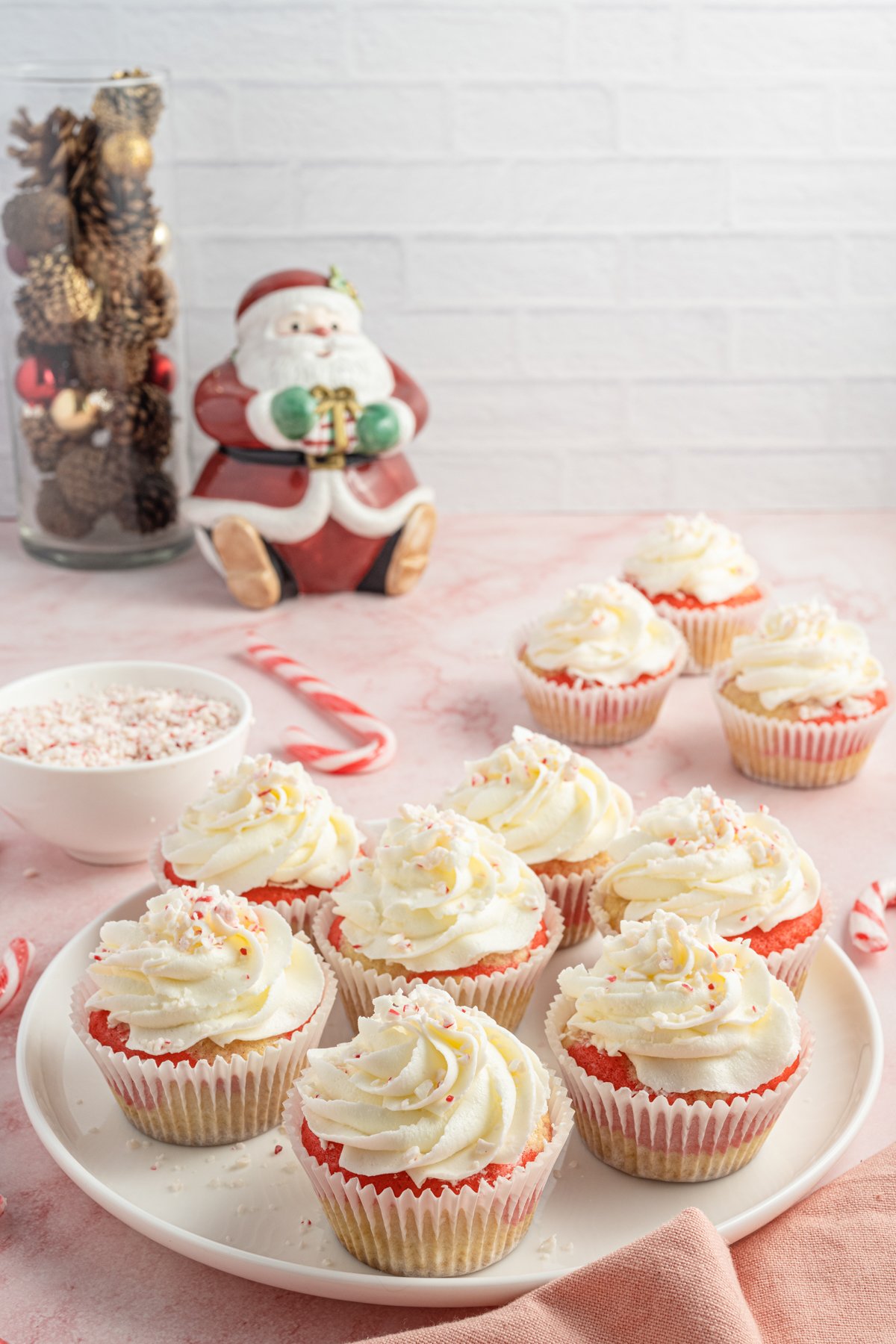 candy cane cupcakes on a white plate