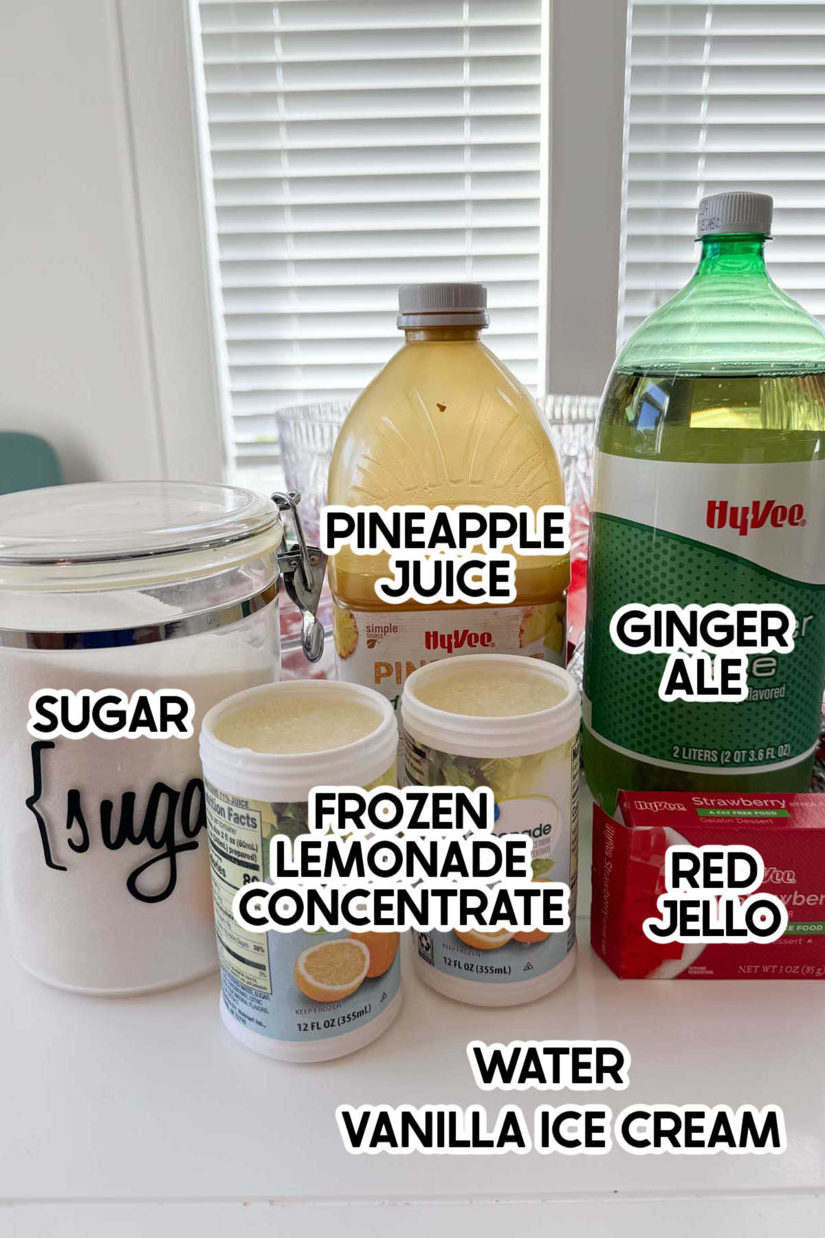 ingredients in a Santa Claus Christmas punch with labels