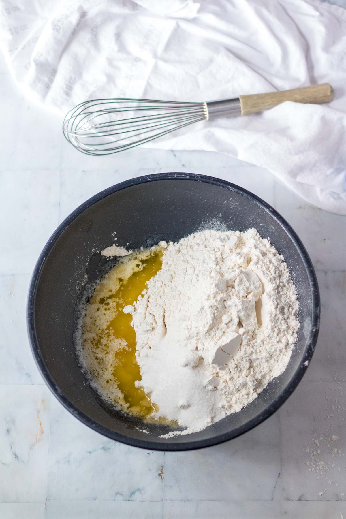 baking ingredients and melted butter in a pan