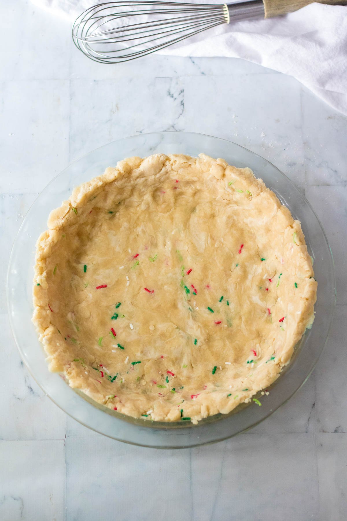 sugar cream pie crust in a glass pie pan