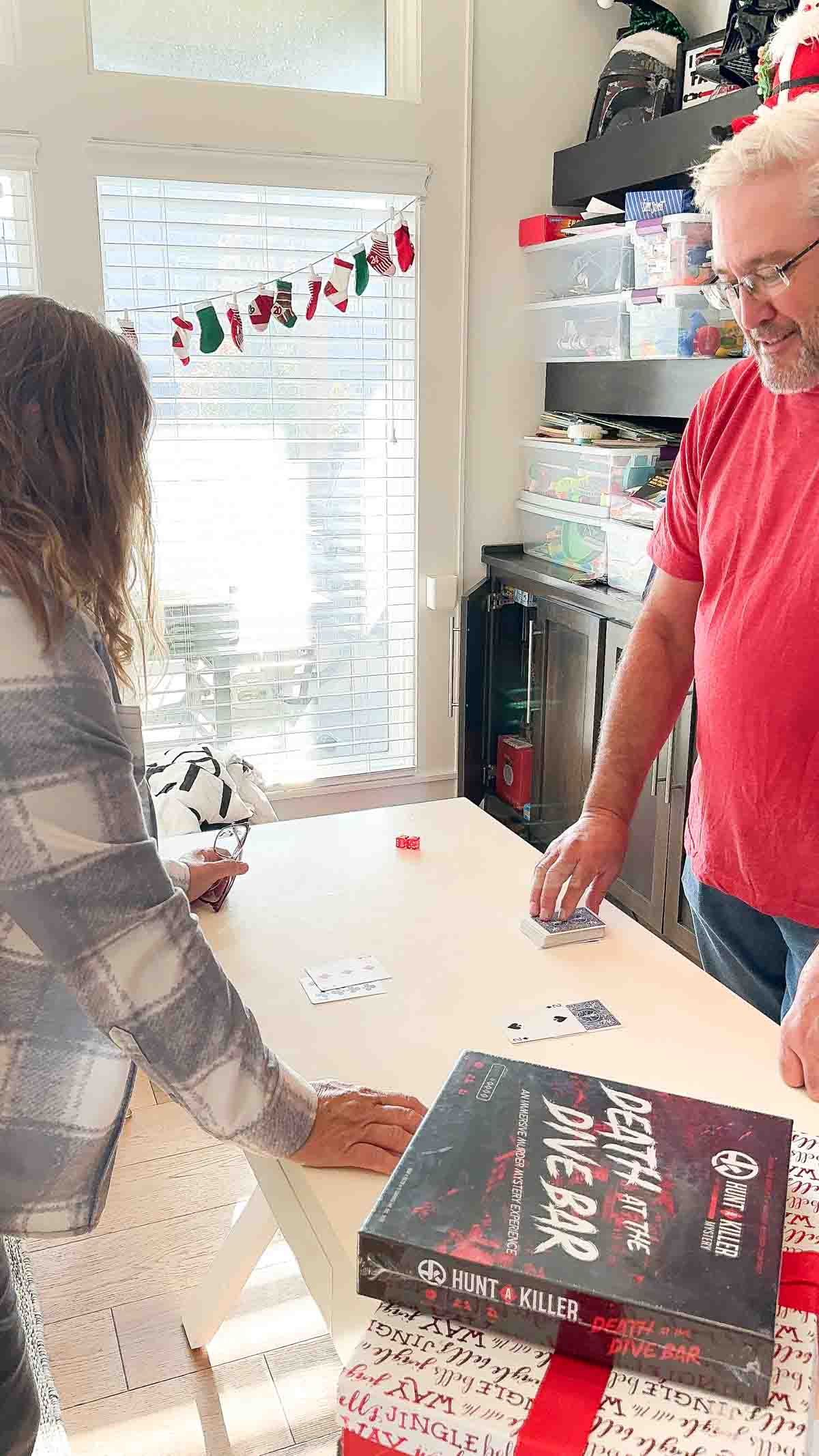 woman playing a game of Black Jack at a white table 