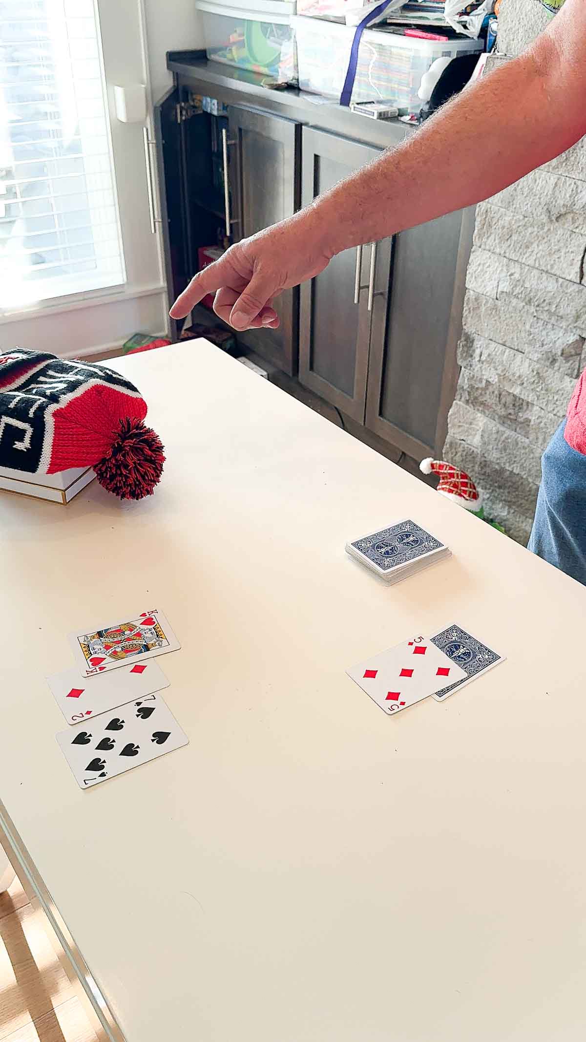 table with playing cards setup in a Black Jack game 