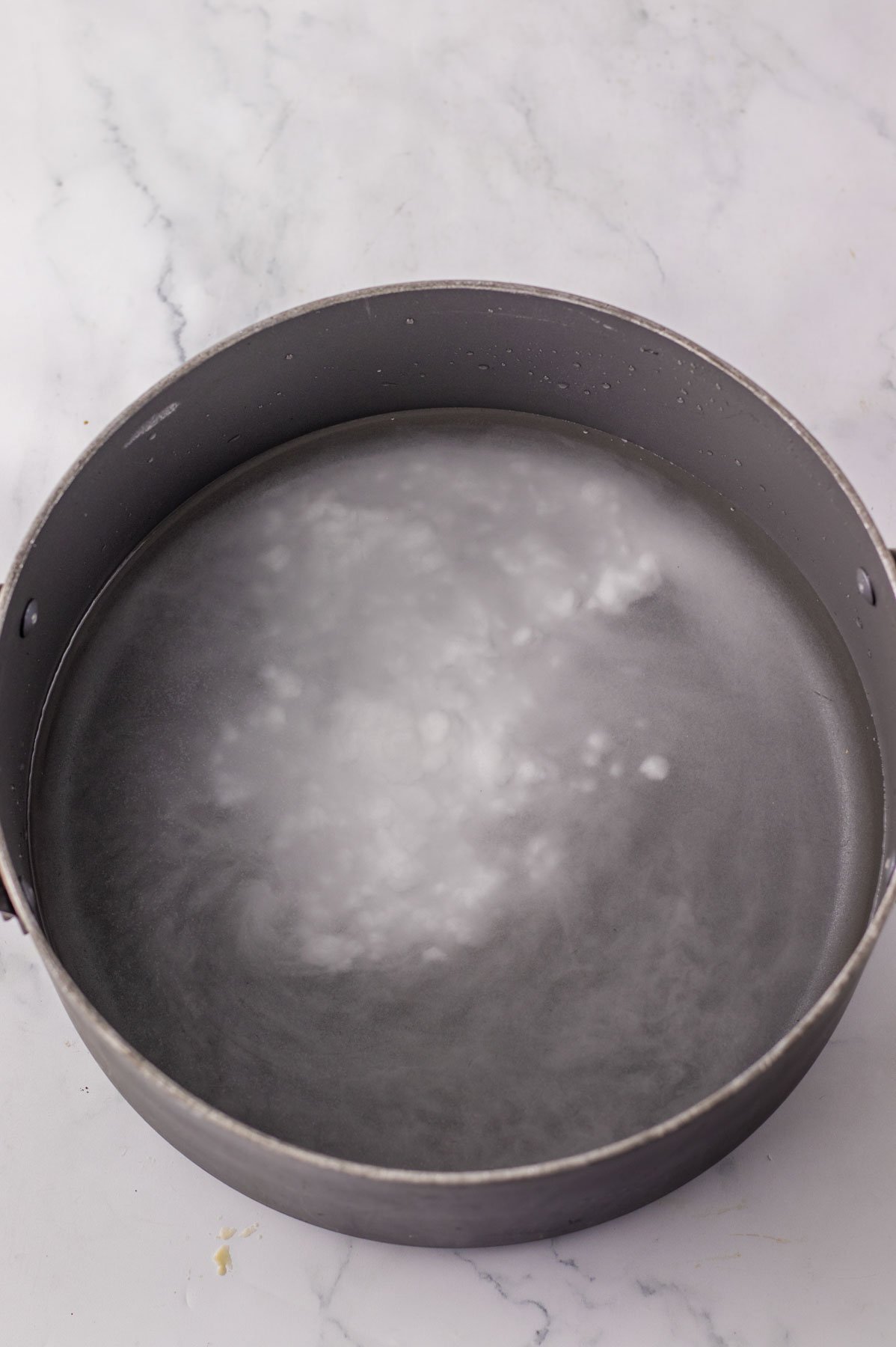 pot with baking soda and water in it