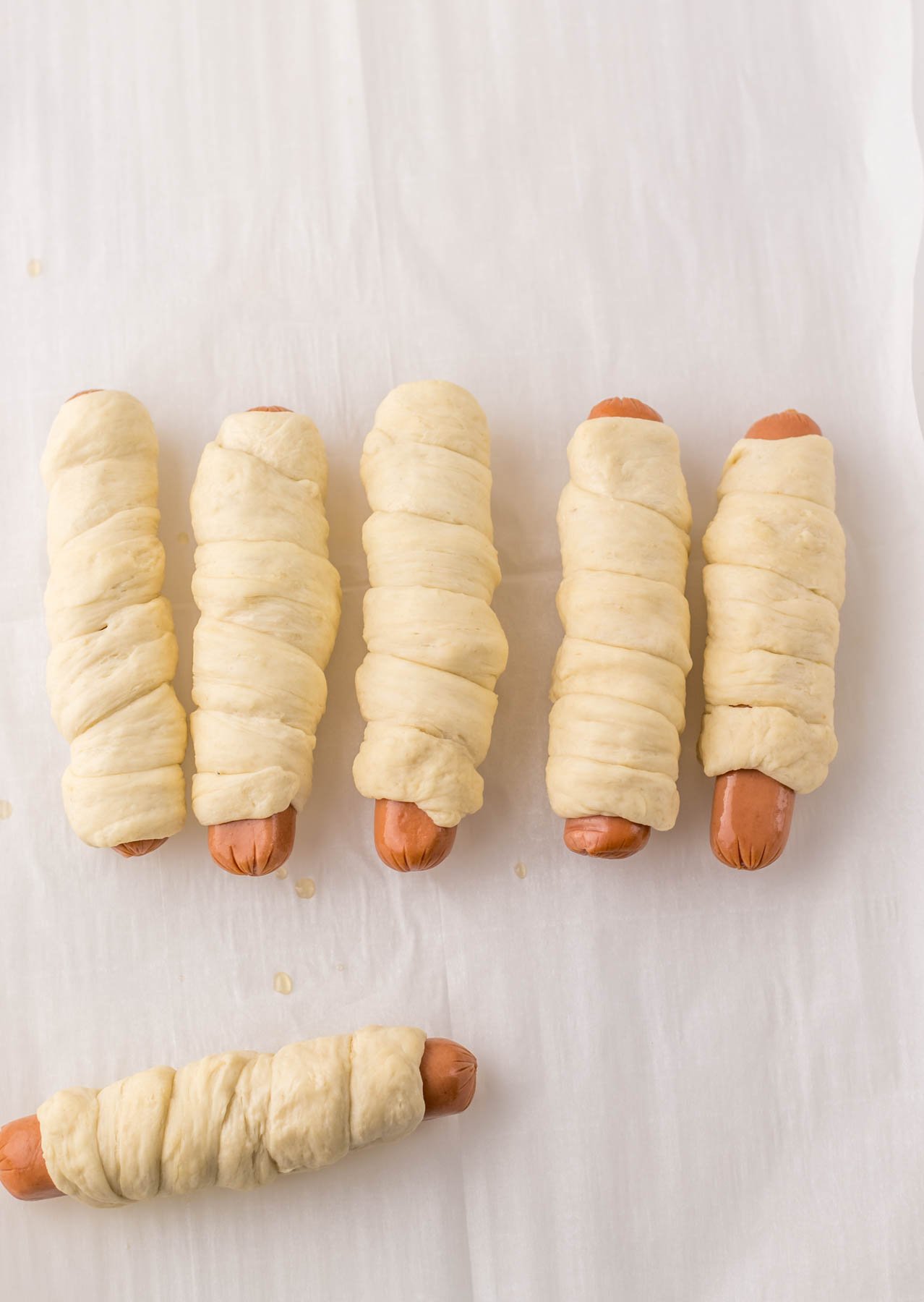 hot dogs wrapped in pretzel dough